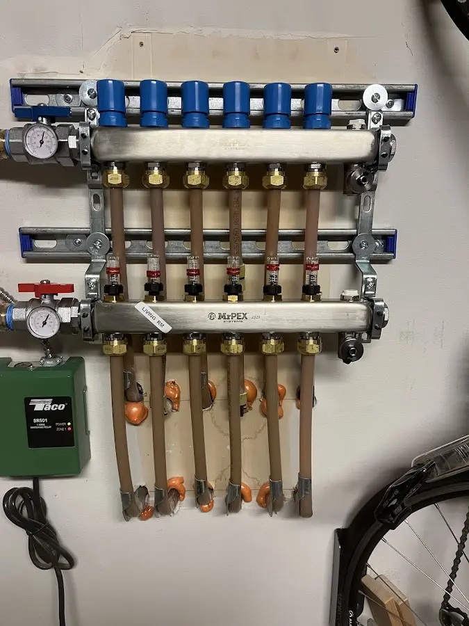 Plumber performing Water Heater Repair at a residential property in Edgmont